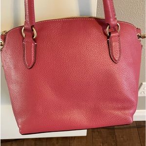 Brand new. Never used. Coach Purse New Raspberry Color